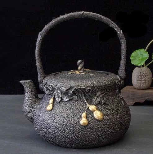 Théière en fonte pour induction